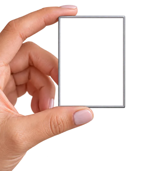 A 2.5x3.5 magnet held in a hand