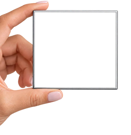 A 3x3 magnet held in a hand
